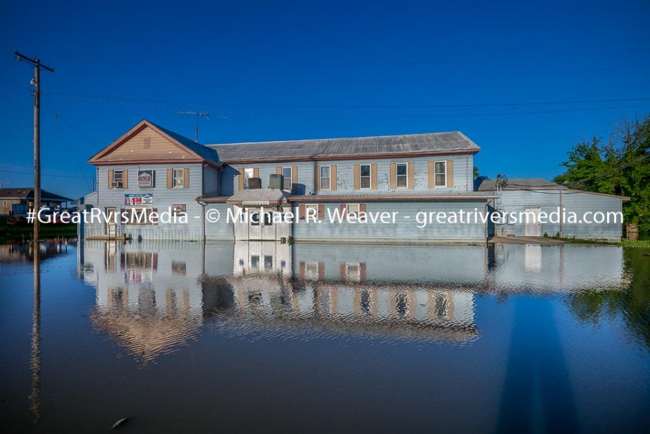 The Kampsville Inn had water at the bottom of the door on Tuesday evening. Further flooding will take the water inside.